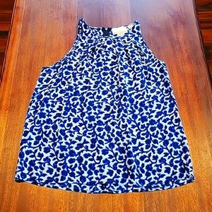 Womens size Medium- sleeveless blouse with flowers.  Great material and fit!